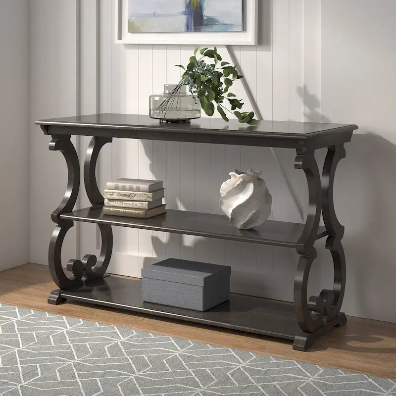 Sofa­tafel van hout met krulmotief